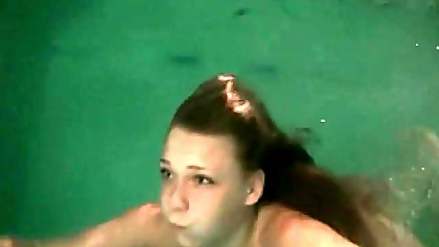 Neatly trimmed pubic hair on teen in pool