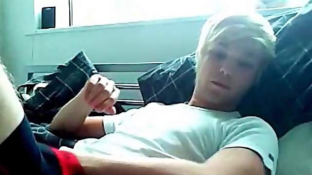 Smooth blonde boy cums on his stomach