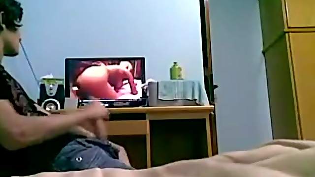 Hidden camera shows him jerking off to porn