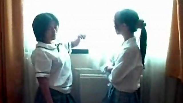 Amateur Asian schoolgirls kiss tits in hotel room