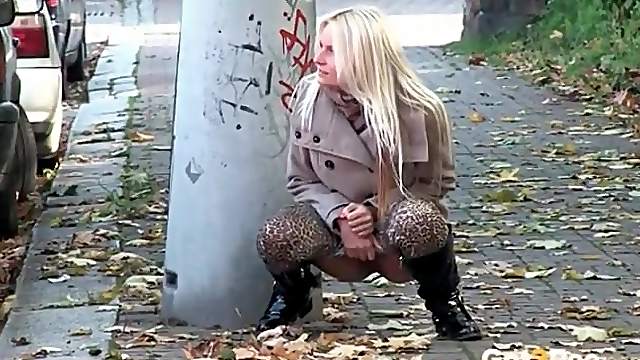 Leopard print leggings and boots on a pissing girl