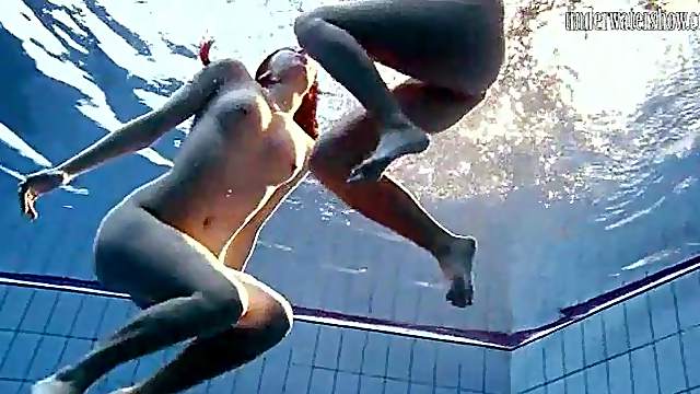 Naked girls swimming erotically underwater
