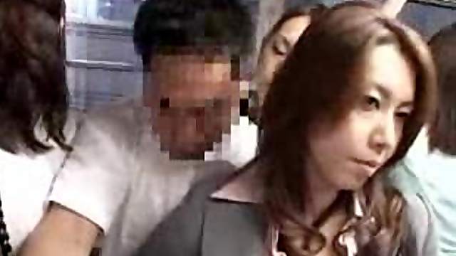 Asian babe strokes his cock on a public bus